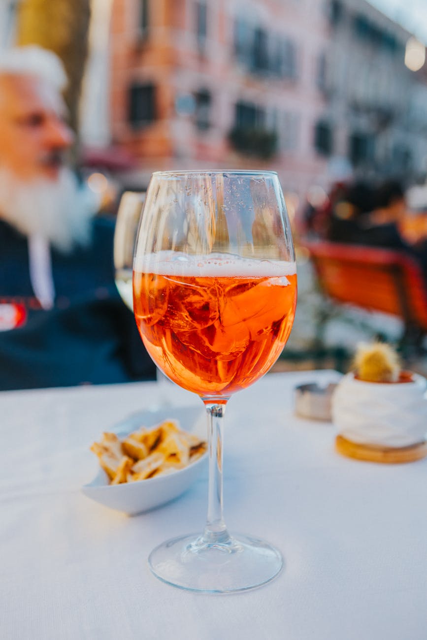 refreshing aperol spritz in outdoor cafe setting